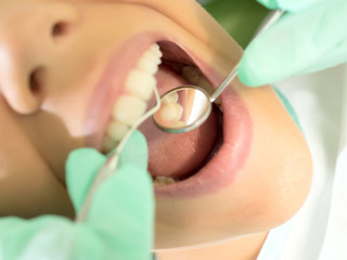 Girl having a dental examination