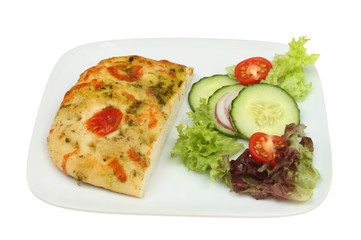 Focaccia and salad on a plate