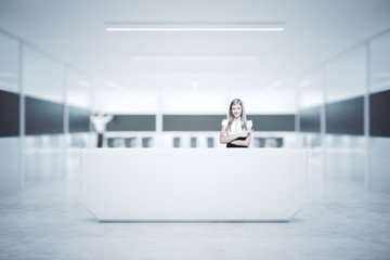 Woman at reception desk