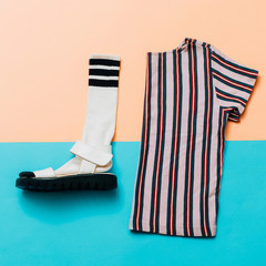 Sandals and socks. T-shirt. A strip of the trend. Summer minimal creative. Hipster style Top view