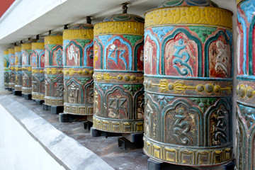 Colorful tibetian prayer wheels in  Swayambhunath Temple, Kathmandu, Nepal
