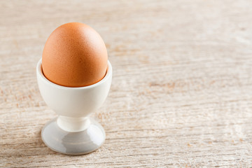 Egg in ceramic cup