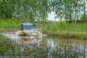 off-road competitions, SUVs overcome water obstacles