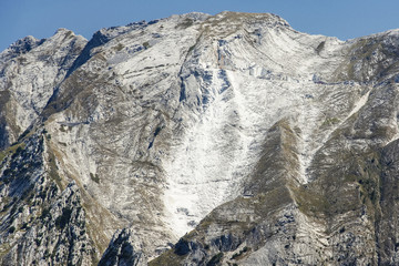 Marble mountain with bruises of the exploitation, near Carrara, Italy