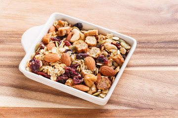 Granola or muesli in ceramic bowl
