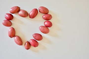 Heart from red pecans