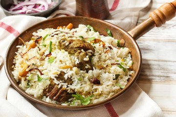 Malabar Lamb / Mutton Biryani served with yogurt dip