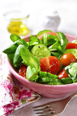 Vegetable salad with mix leaves,tomato and cucumber.