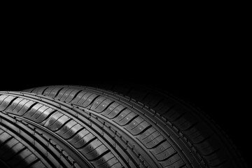 Car tires on black background