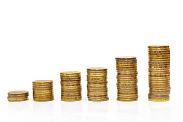 columns from gold coins isolated on a white background