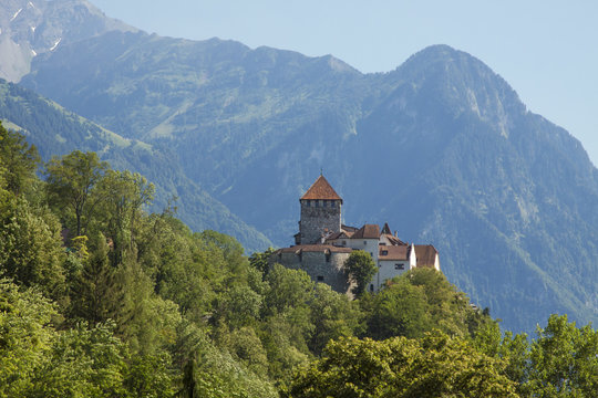 Liechtenstein - Vaduz - Vaduz castle (Schloss Vaduz) is the palace and official residence of the Prince of Liechtenstein, with the mountain range on the backdrop