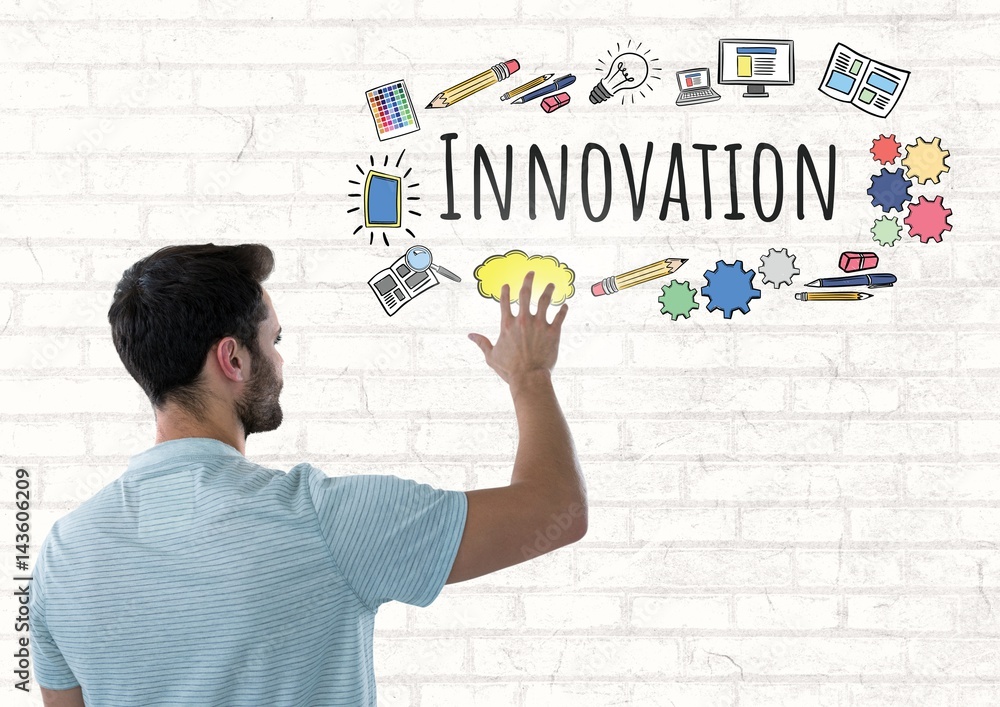 Fototapete man touching innovation text with drawings graphics