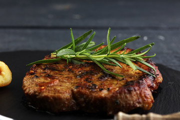 Grilled steaks, baked dumplings potatoes