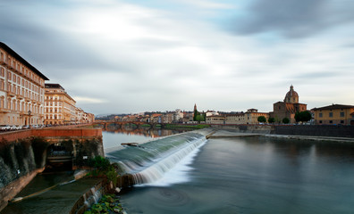 Fototapeta na wymiar Arno river panorama at sunset, Florence, Italy,