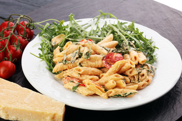 Whole Wheat Pasta Salad with Fresh Arugula, Mozzarella, Roasted Red Bell Peppers and Pesto Sauce