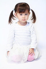 Japanese girl sitting on the floor (2 years old)