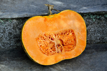 Cross section of a pumpkin isolated on nature background