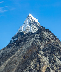 Cholo (6089 m) peak in the area of Cho Oyu. View Ngozumba glacier near Thopak Tsho (4990 m) - Gokyo...