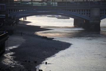View of the Thames at dusk. Low tide