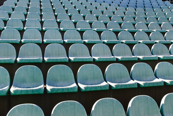 Fototapeta premium Rows of old theater chairs in the open air. Background