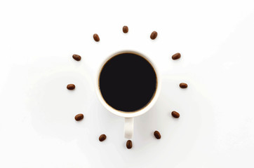 Coffee cup on saucer and coffee beans against white background forming clock dial. offee as symbol of morning energy and cheerfulness or evening refreshment.