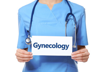 Close up view of doctor holding blank paper sheet on white background