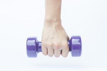 Woman hand holding dumbbell weight isolated on white background