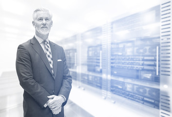 Fototapeta premium Senior businessman in server room