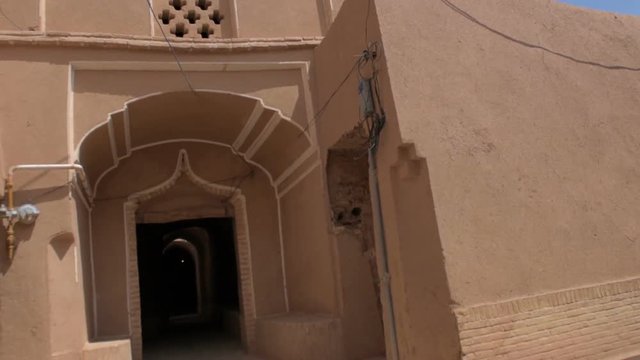 street in a historical part of the city of Meybod in sunny day, the city in the central part of Iran.