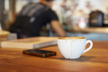 Coffee cup on wooden table