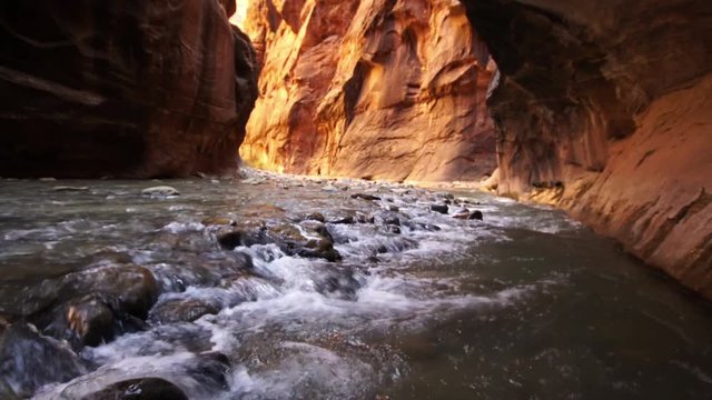 View of river flowing through Zion Narrows