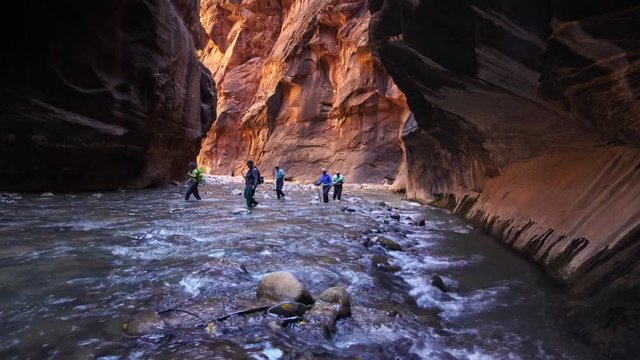 View of Zion Narrows as people are hiking