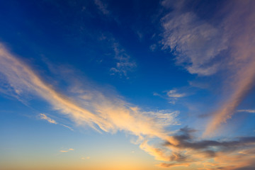 Fototapeta na wymiar Blue sky, some clouds at sunset