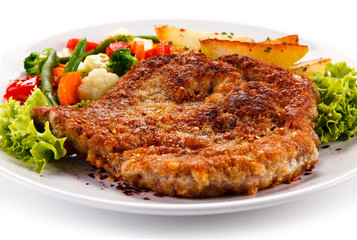 Fried pork chop with potatoes