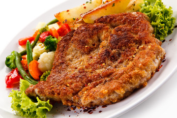 Fried pork chop with potatoes