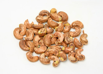 Fototapeta na wymiar cashew nut with peel on white background