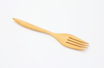 wooden fork on white background