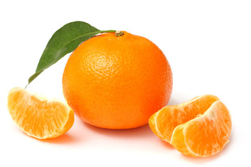mandarin with green leaf isolated on white background