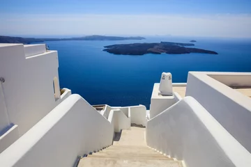 Fotobehang Whitewashed roofs and stairs in Santorini, Greece © Rawf8