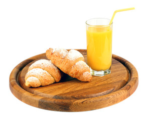 fresh croissant with juice on wood isolated on white background