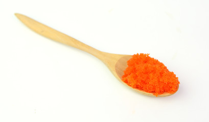 orange tobiko or Egg shrimp in wood spoon