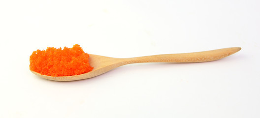orange tobiko or Egg shrimp in wood spoon