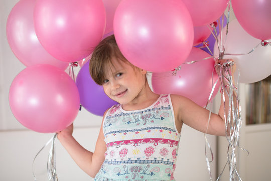 Girl Child Rejoices With Balloon Concept Childhood