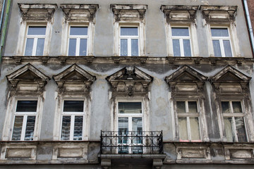 Fototapeta na wymiar Facade of the old vintage design house with balcony