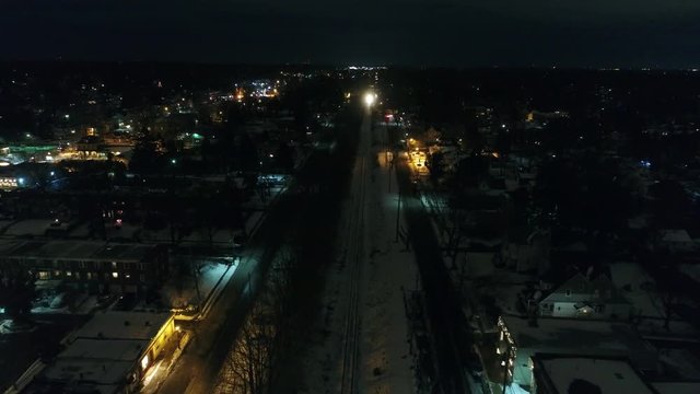 Freight Train Headed towards Philadelphia from New Jersey at Night with Snow