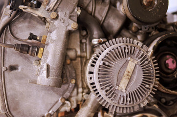 a dirty old car engine close-up