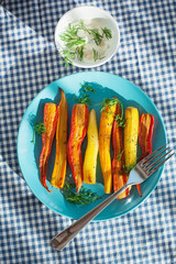 roasted colorful carrots on plate