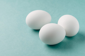 Eggs on green background