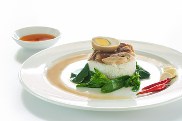 Thai pork leg stew with rice and boiled egg