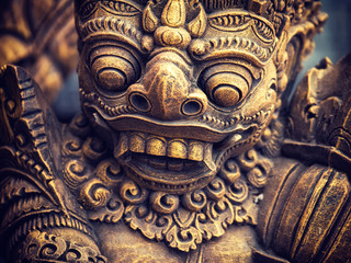 Gardian statue at the Bali temple entrance